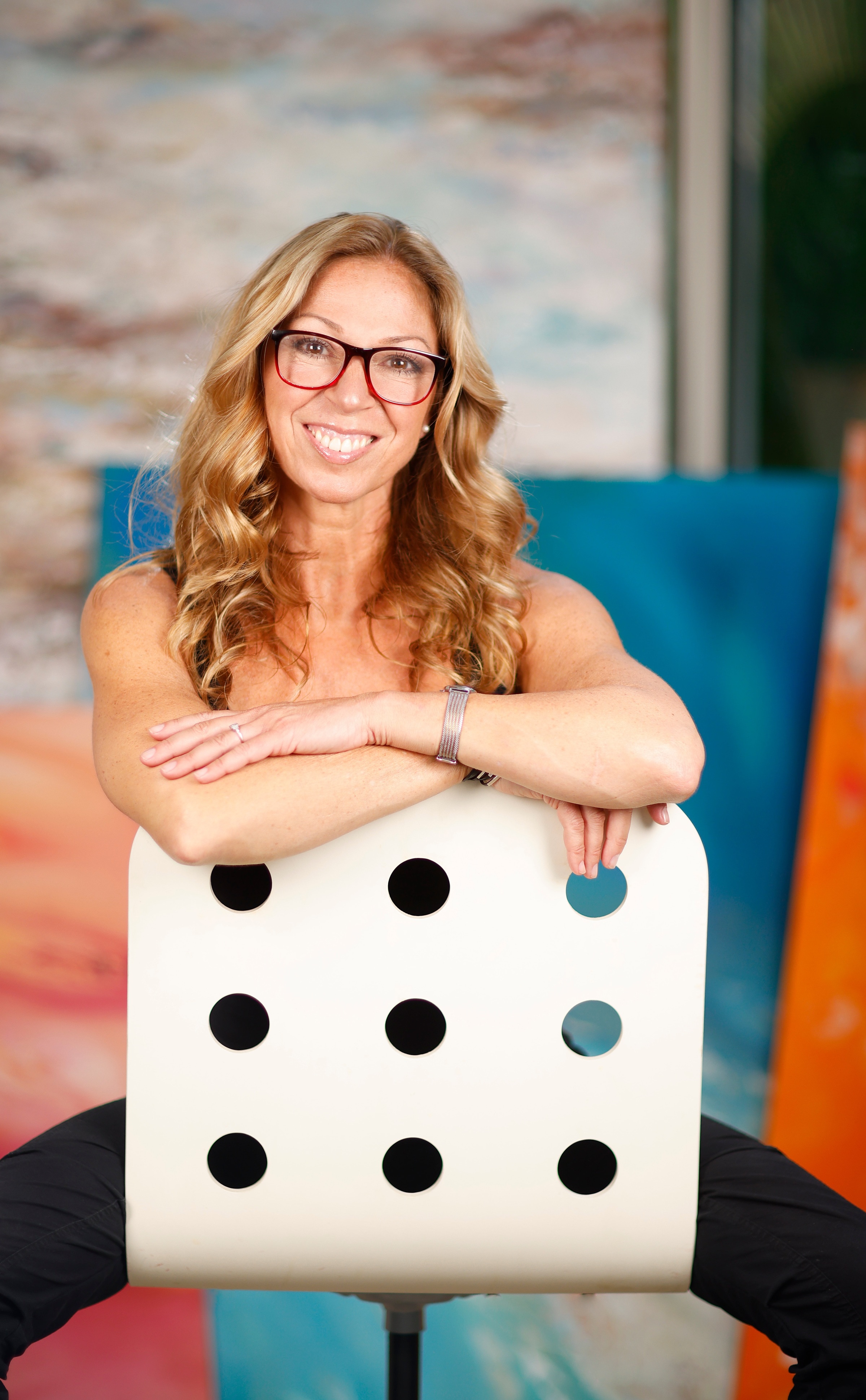 Ritushka, contemporary abstract landscape and seascape artist, in her Lane Cove studio